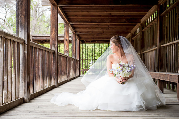 Gorgeous Morgan poses in her wedding dress at the Fort Worth Botanical Gardens.