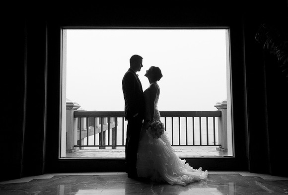 Silhouette of bride and groom in Monterrey, California.