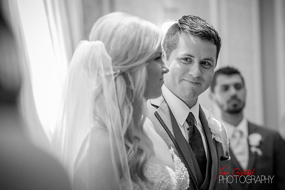 Brett, the groom, looks with admiration of his bride, Robbyn. Shot at the Sheraton in McKinney, TX.