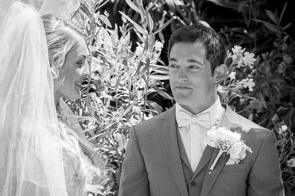 The groom beams with pride as he looks upon his lovely bride. El Cortijo De Los Caballos in Spain.